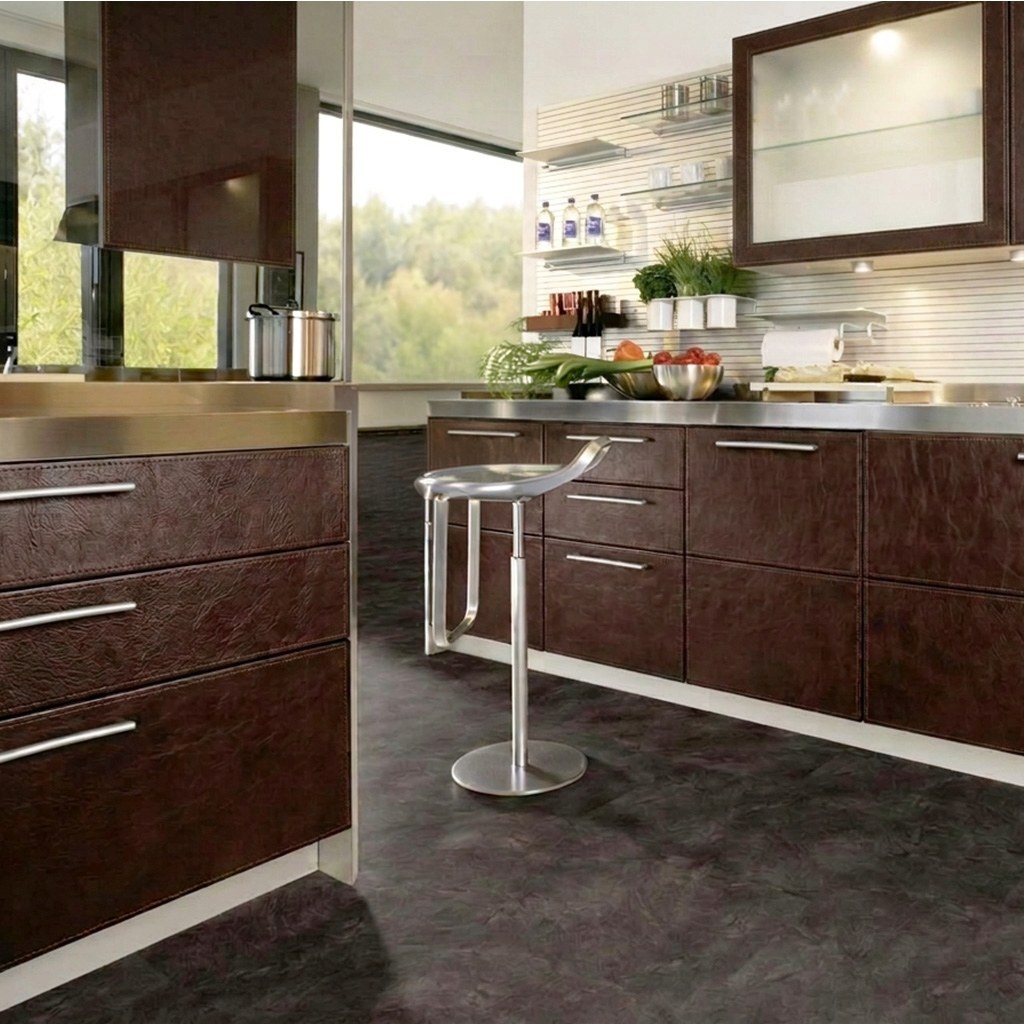 Kitchen fronts finished in exclusive brown leather.